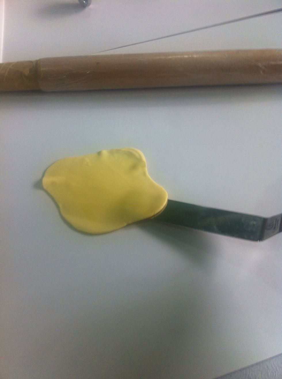 Easy to remove. Try this technique and you'll be happy kneading and making plenty of toppers!:)