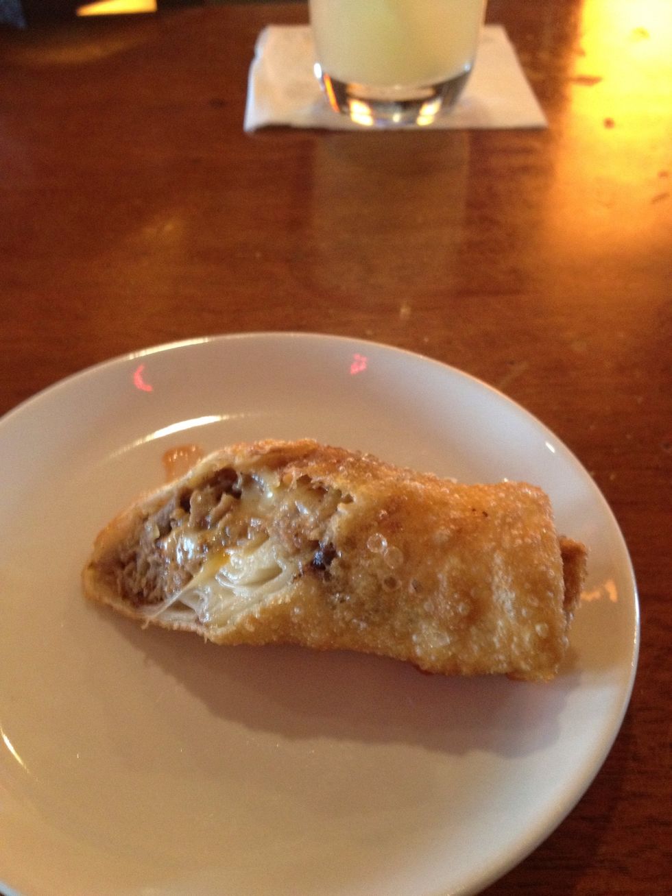 Eat some fried/greasy food. In this case it is a Philly cheesesteak egg roll.