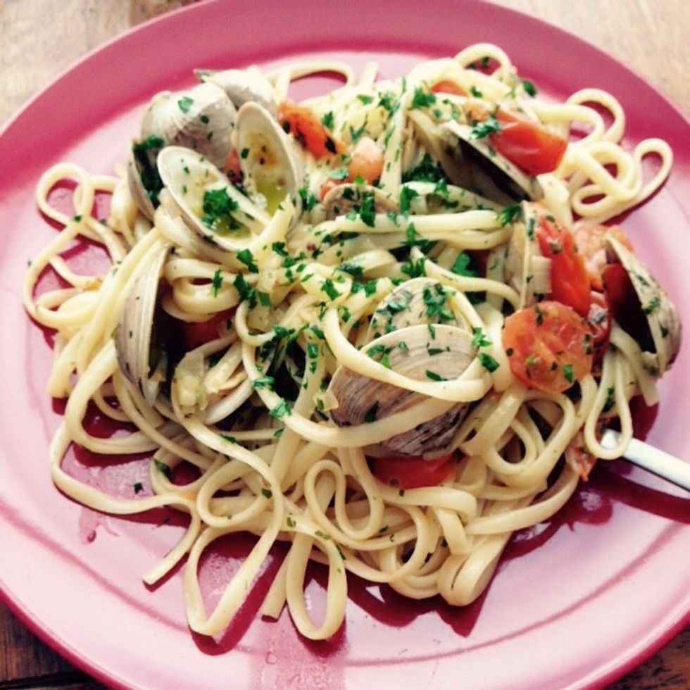 Edit: if you want to add a little more color, you can add a shallot to the garlic in the soffritto, and the toss in halved cherry tomatoes as soon as the clams start opening. Enjoy!