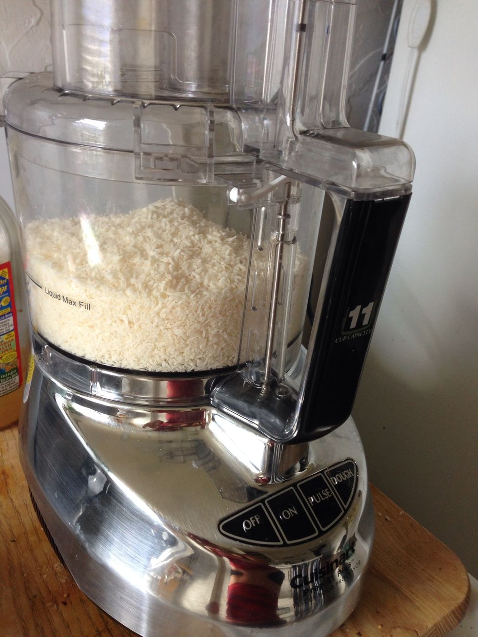 Edit: You don't have to do anything to the shredded coconut, but I like to process the coconut for about 2-3 minutes or until it gets fluffy but before it turns creamy. Makes it a creamier macaroon.