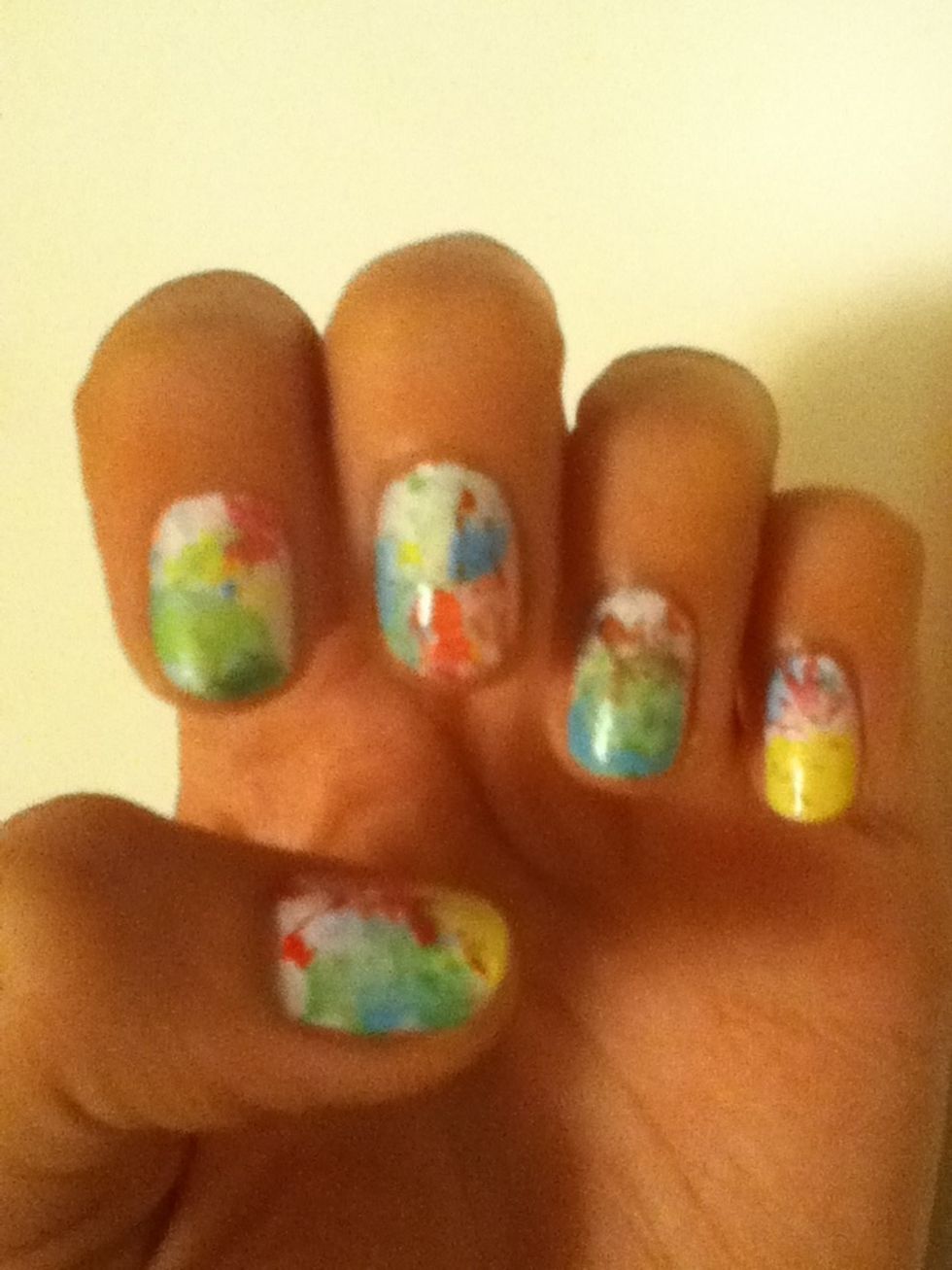 EEK! What a mess... -_- take nail polish remover and a Q- tip and clean up the edges