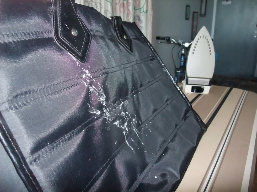 Egads, a candle dripped on my bag (skirt/pants/whatever)! However will I eradicate this parrafin stain?
