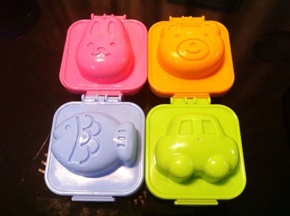 Egg molds can be found at Japanese shops selling bento stuffs.