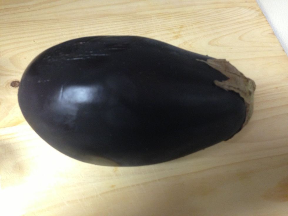 Egg plant(1): peel off skin and cut into pieces like cube shapes and boil in hot water for about 5-10mins and then pour it into a sieve for the water to drain out. Will mix it with corned beef later.