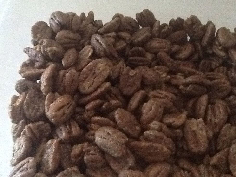 Egg white, cinnamon, stevia coated pecans, dried in the oven.