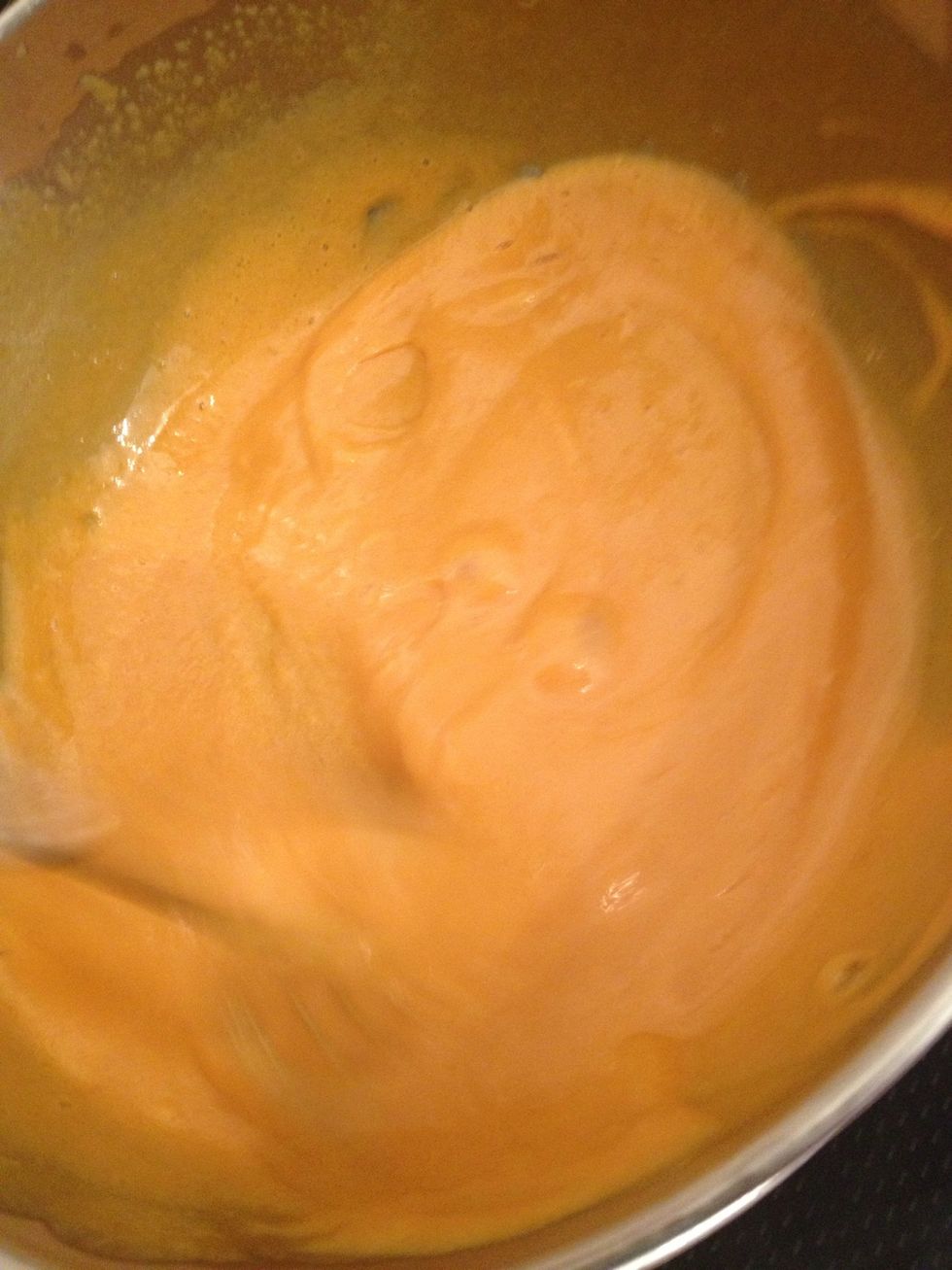 Egg yolks and caramel cream over Bain-Marie