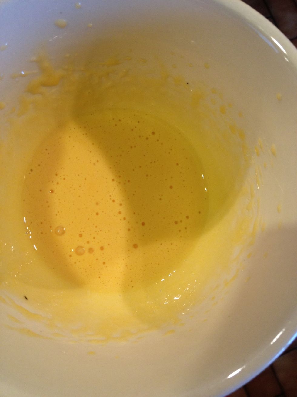 Egg yolks should be frothy like this. Add them to the butter-sugar and beat well until combined.