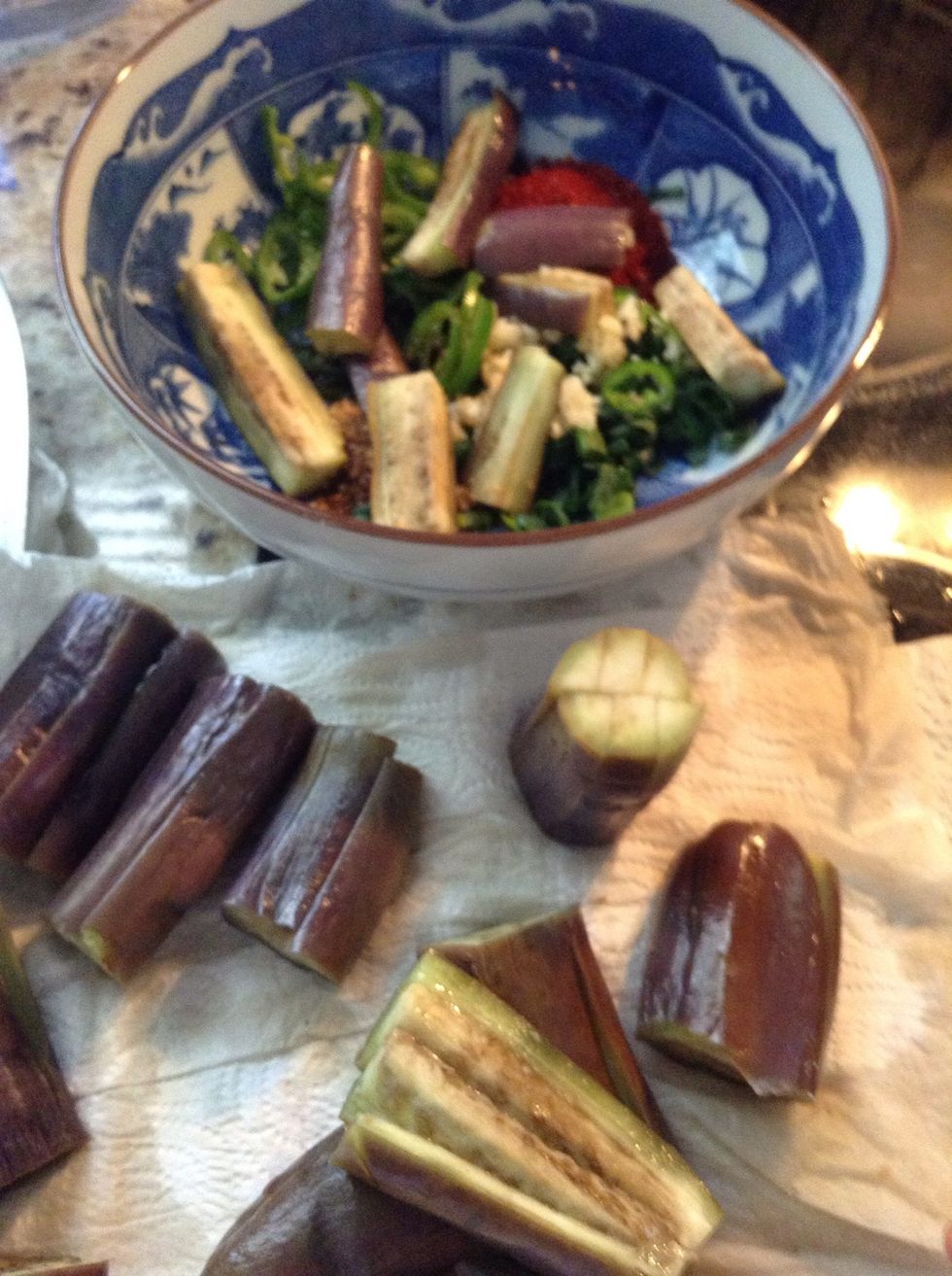 Eggplant strips should,literally, just fall apart. Add them into ingredient bowl.