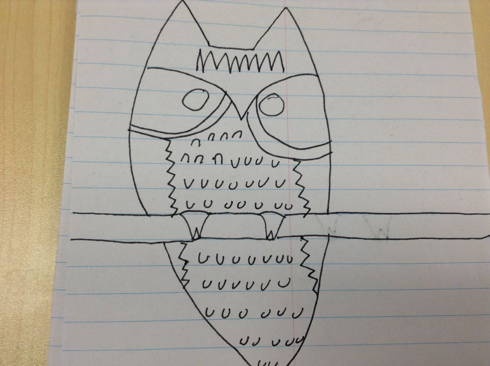 Eighth, draw zig-zags on the forehead and on the sides. In the middle draw small u's.