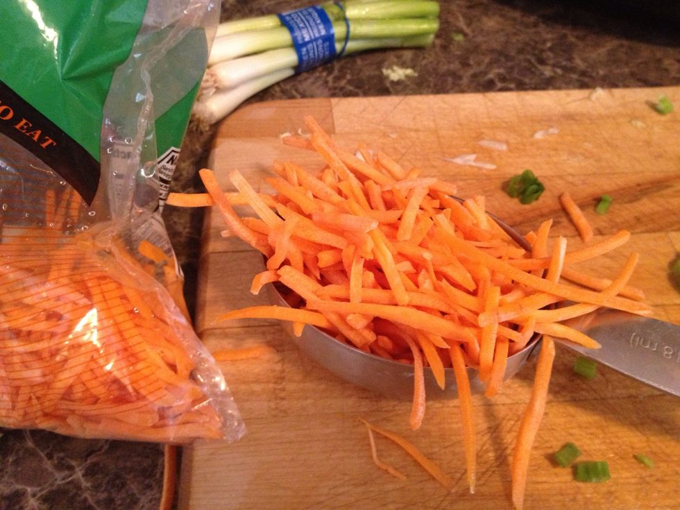Either chop or buy shredded carrots. Measure out 1/2 cup.