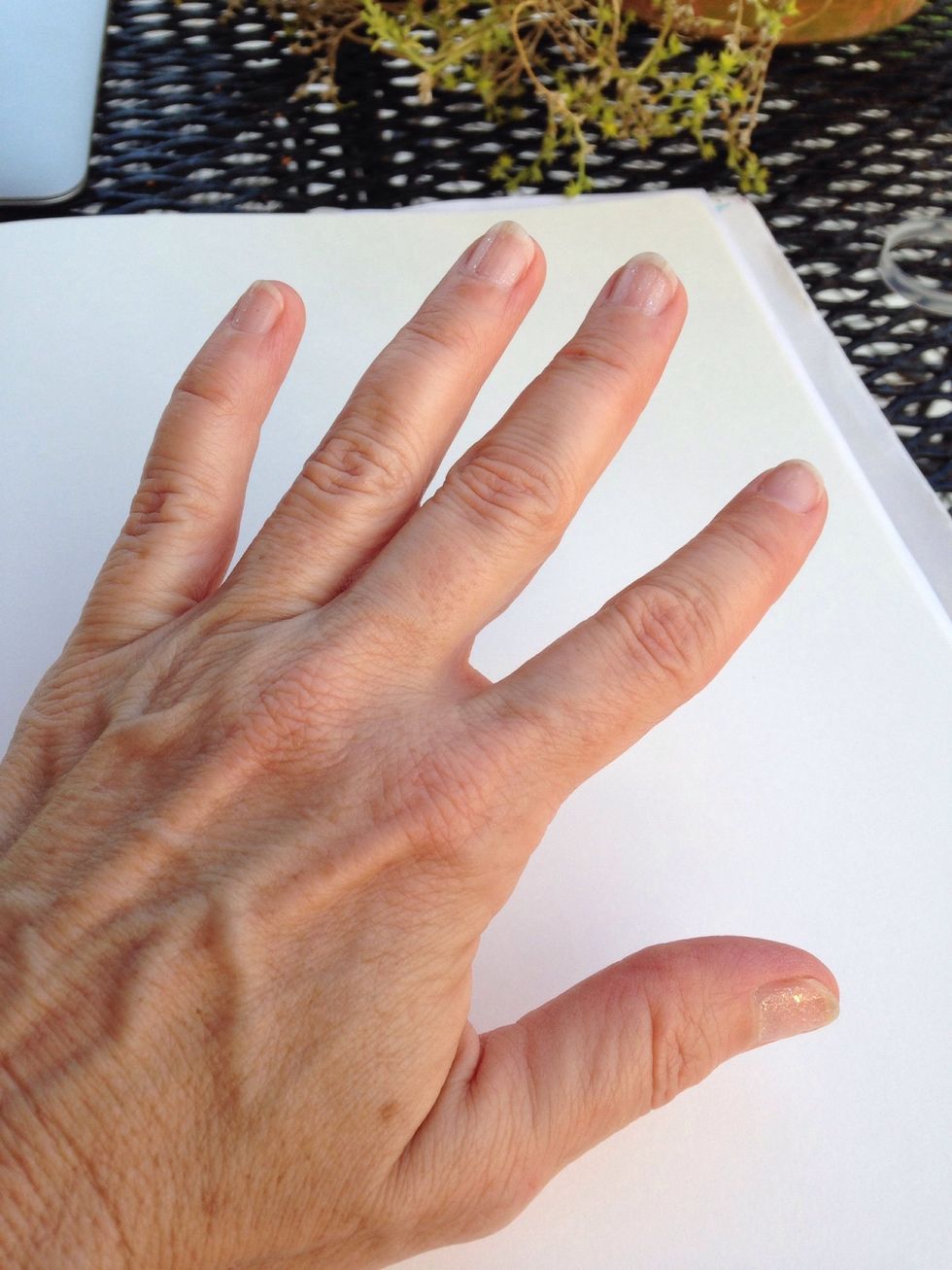 Either draw or trace your hand