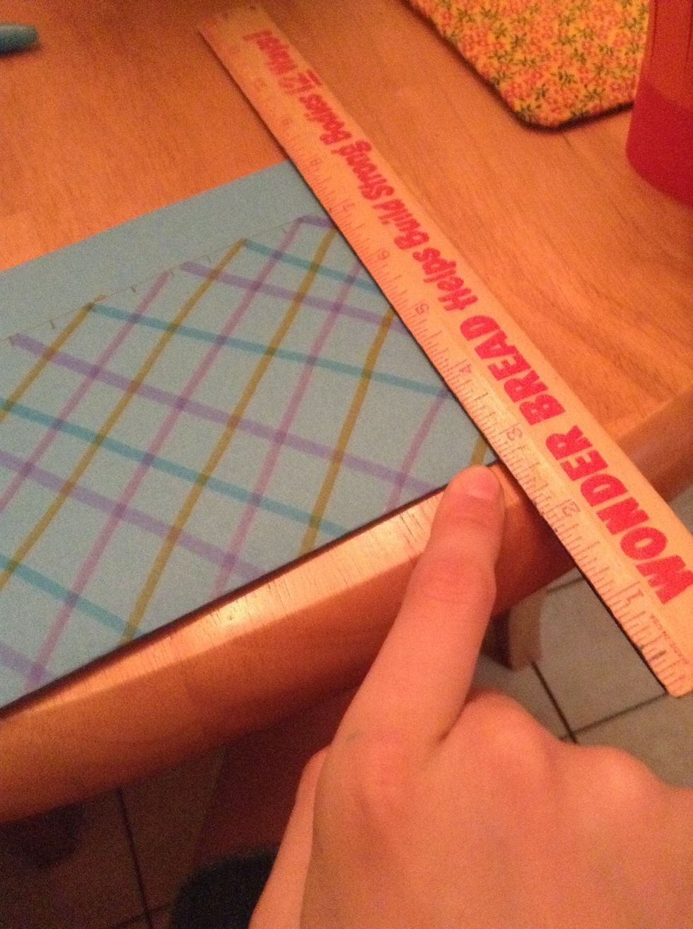 Either make a very light line or if you are confident make only a hash where I'm pointing