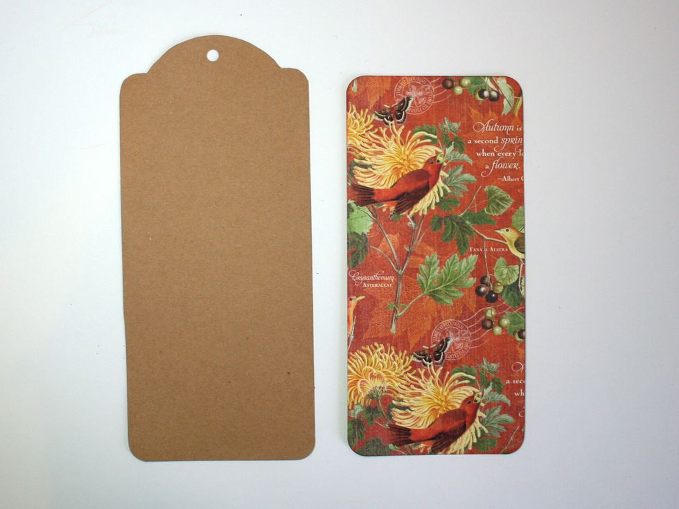 Either use a G45 kraft tag or cut your own from cardstock. Cut a 3 5/8"w x 7 3/4"h rectangle from November Flourish paper and round the corners.
