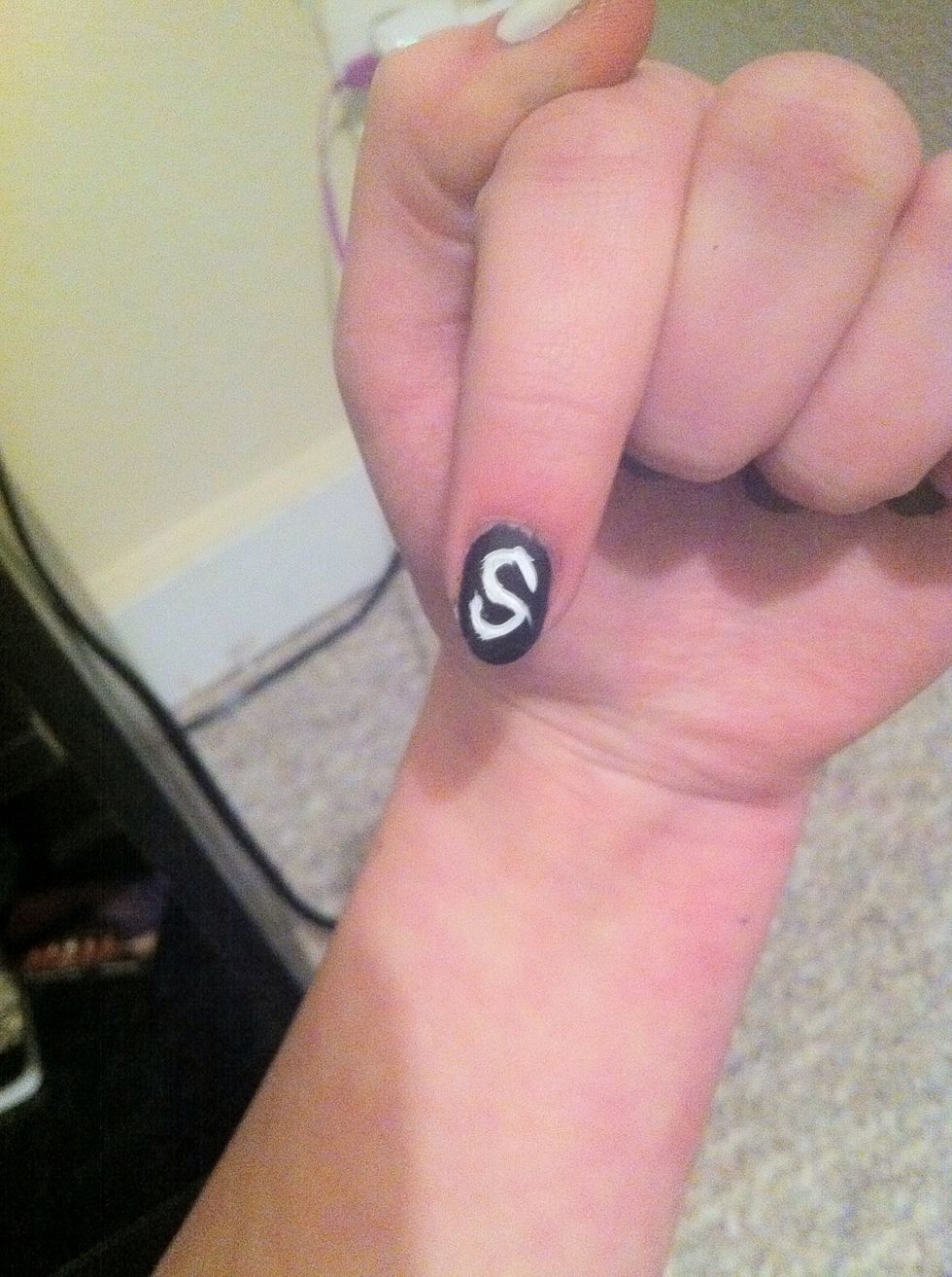 Either using a striper brush or a nail art pen, paint a capital "S",(for Sleeping). **mines a bit sloppy but I'll fix it up later**