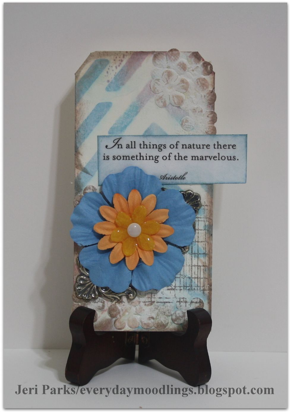 Embellish tag background as desired. Check out my blog for more inspiration. http://everydaymoodlings.blogspot.com/