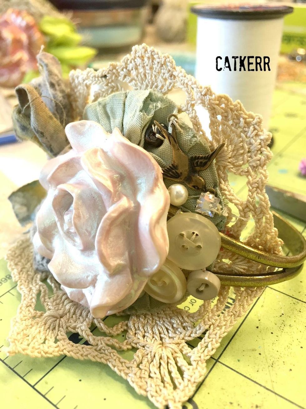 Embellish with Sari Ribbon,buttons,rhinestones.