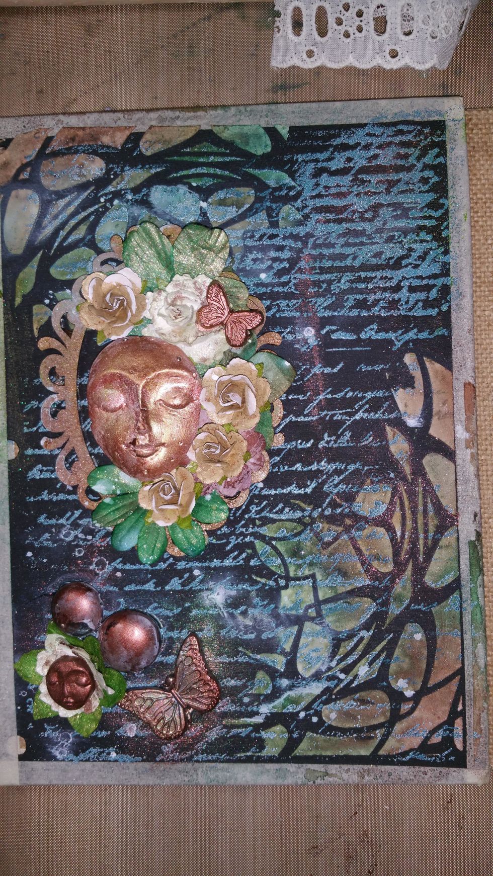 Embellishments and frame were then painted using more Art Anthology Metal Effects Bronze, and Velvet in Terracotta. The chipboard frame was also dabbed with a hint of Sorbet in Parakeet