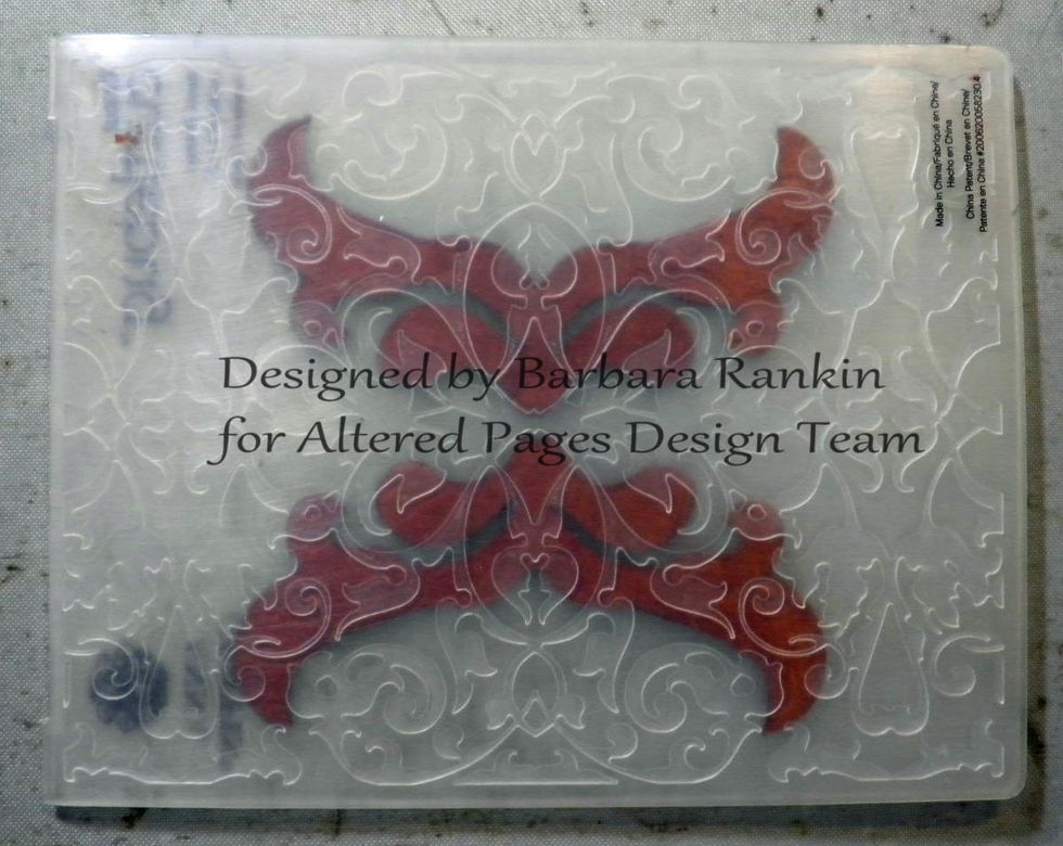 Emboss both corners with the embossing folder.