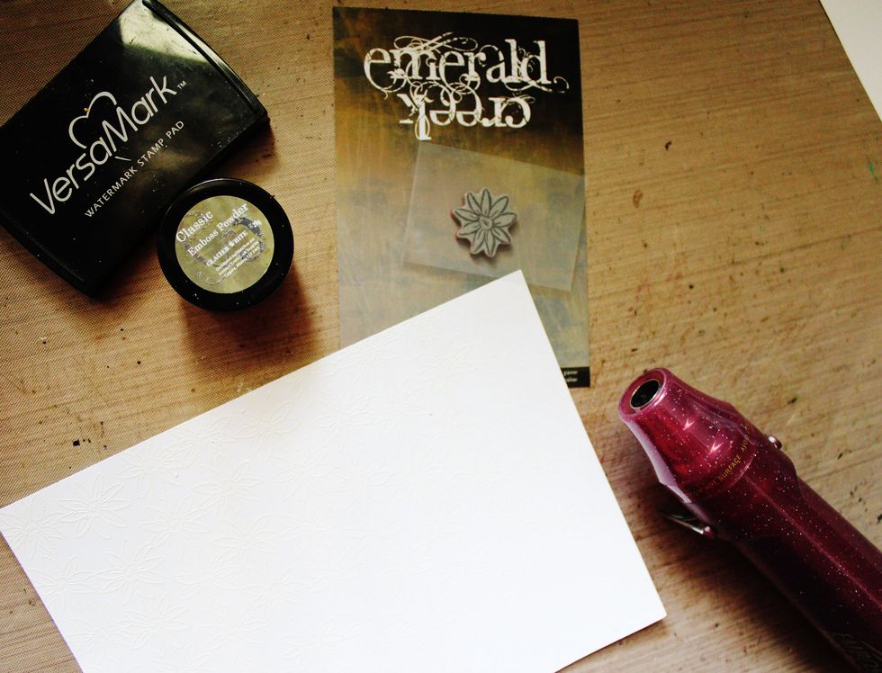 Emboss white card stock with Emerald Creek Glacier White Embossing Powder using VersaMark and heat tool.