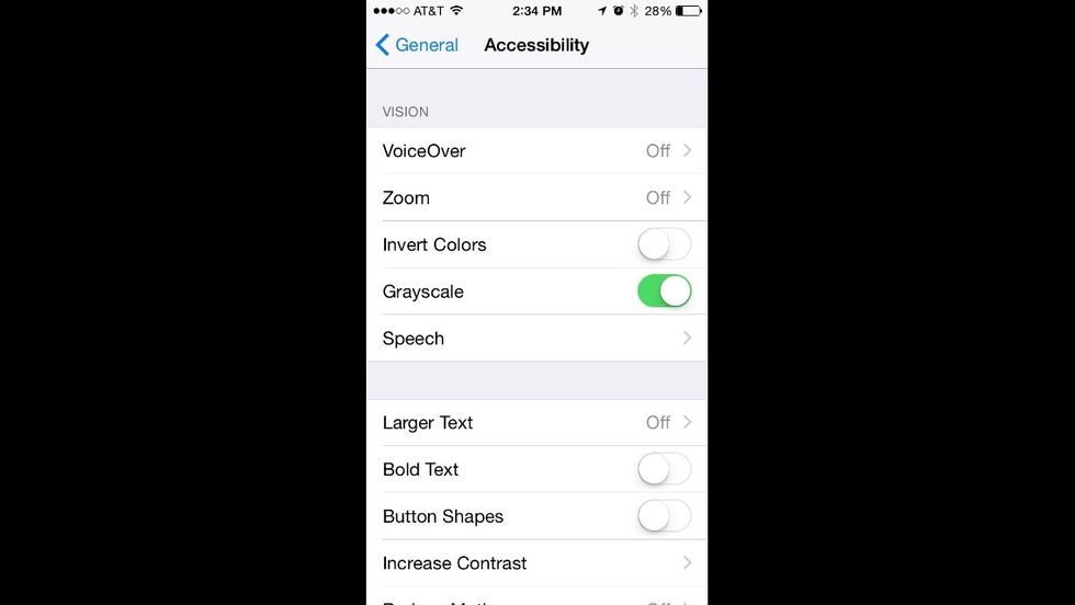 Enable the option to use your iOS device in grayscale mode.