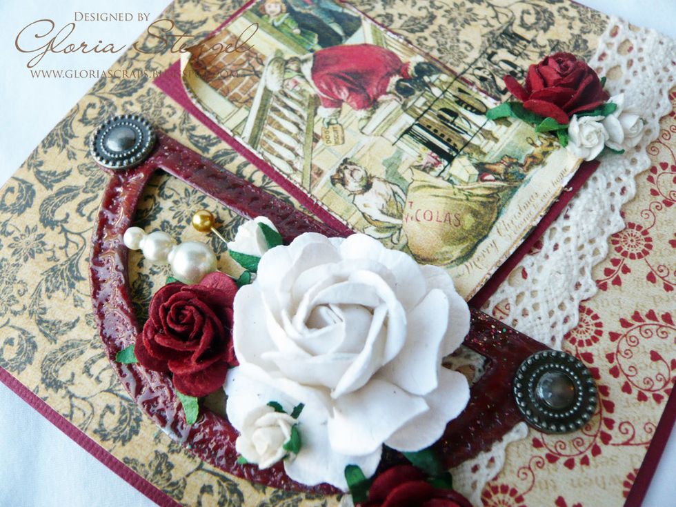 Enamel the metal frame by using several layers of colored embossing powder, allowing it to clump in places. Heat between layers. (Be careful of HOT metal!)