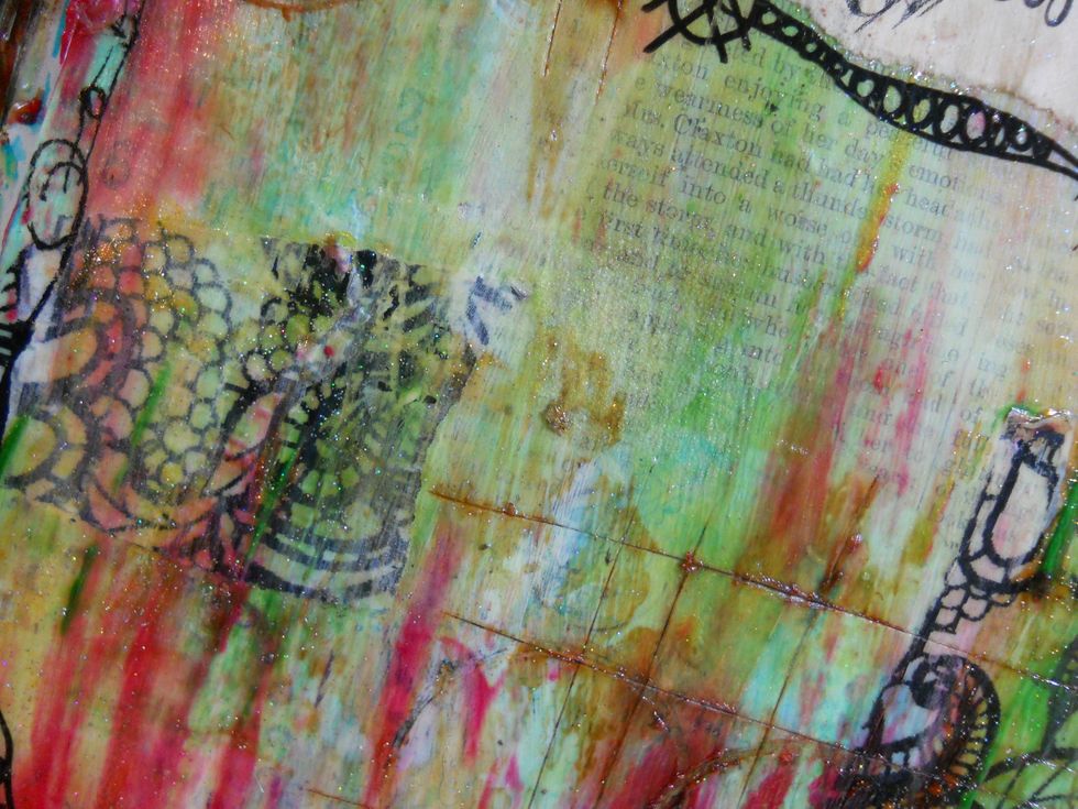 Encaustic art is where you build layers of paint and beeswax to create a project this has great depth, but each layer can be viewed independently. This beeswax is melted/painted on top of each layer.