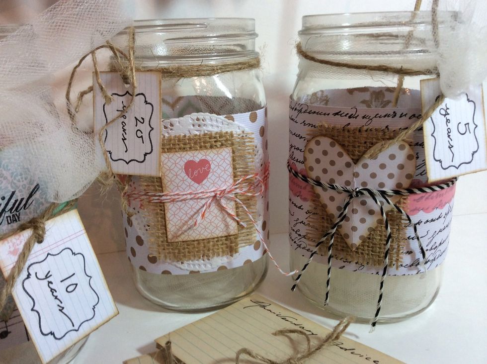 Encourage guests to write their advice for each anniversary and tuck inside the corresponding jar.