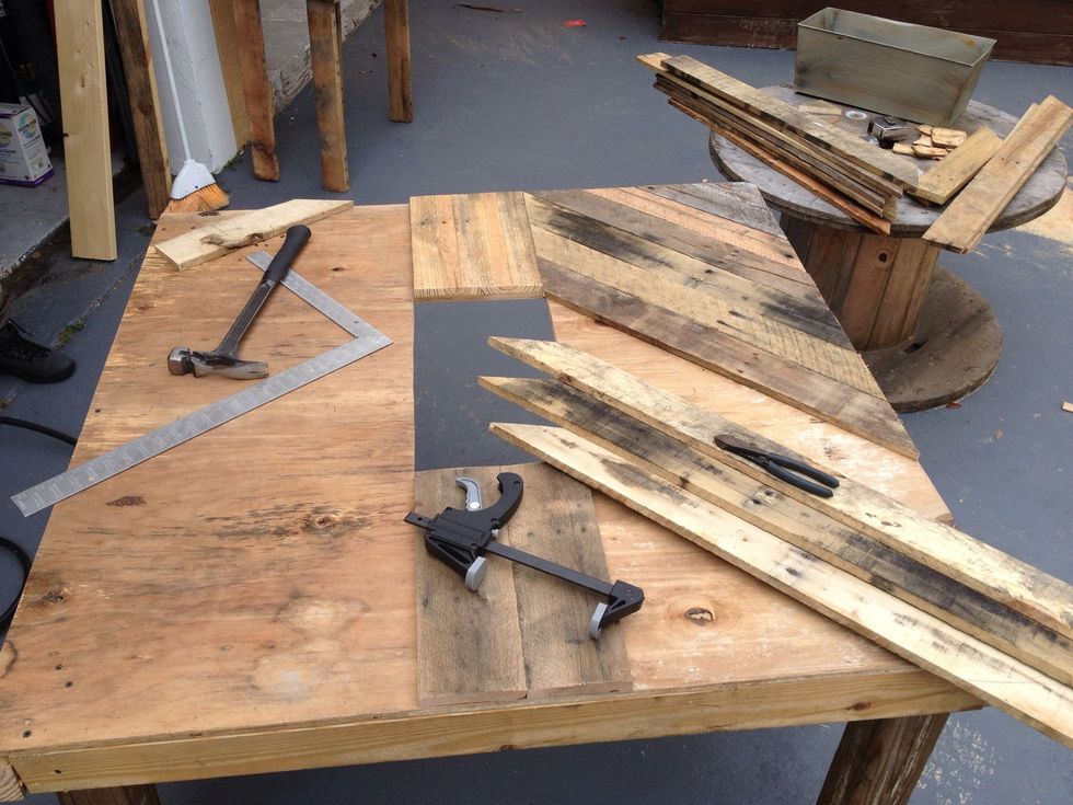 Ended up cutting boards to the same width as the bucket, then adding to the sides