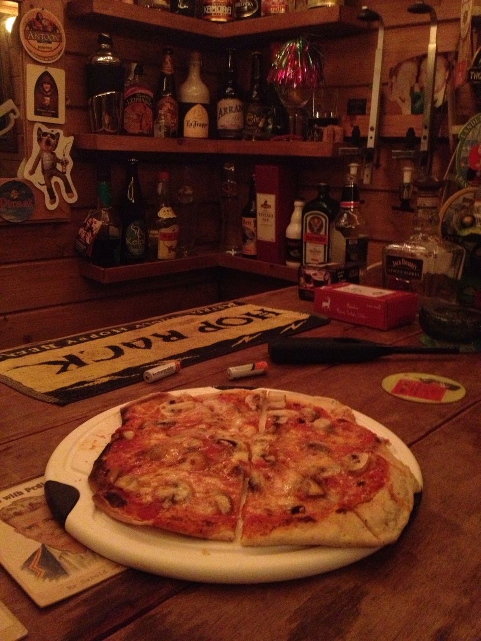 Enjoy at a wooden bar with beer and friends!