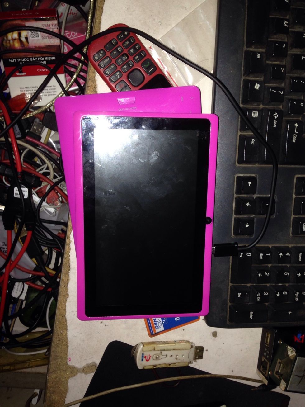 Enter TB512 to download mode by press VOL UP , insert cable yhen press POWER few times. Download firmware http://public.tempoaustralia.com/fw/tb512-16gb/20121015/TB512-16GB_Build20121015.rar.