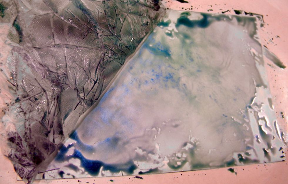 Epic Fail! I crumpled up Saran wrap and placed it on top of the inks to create a unique pattern. When I checked it the next day, it hadn't dried a bit and the colors were mixed together.