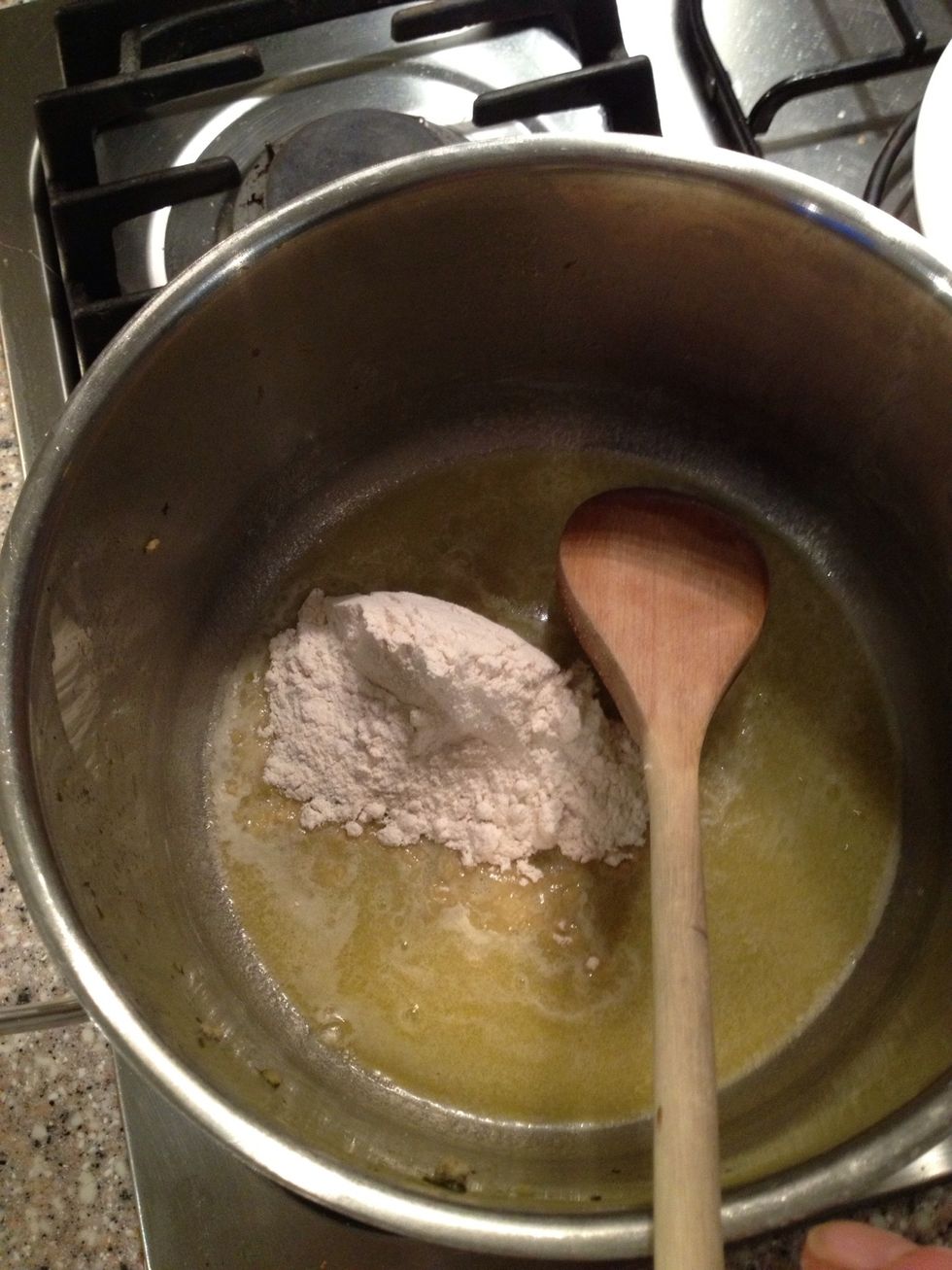 Equal amount of flour and butter to make a b\u00e9chamel kind of sauce. I'm not giving any measurements, it depends on the amount of broth.