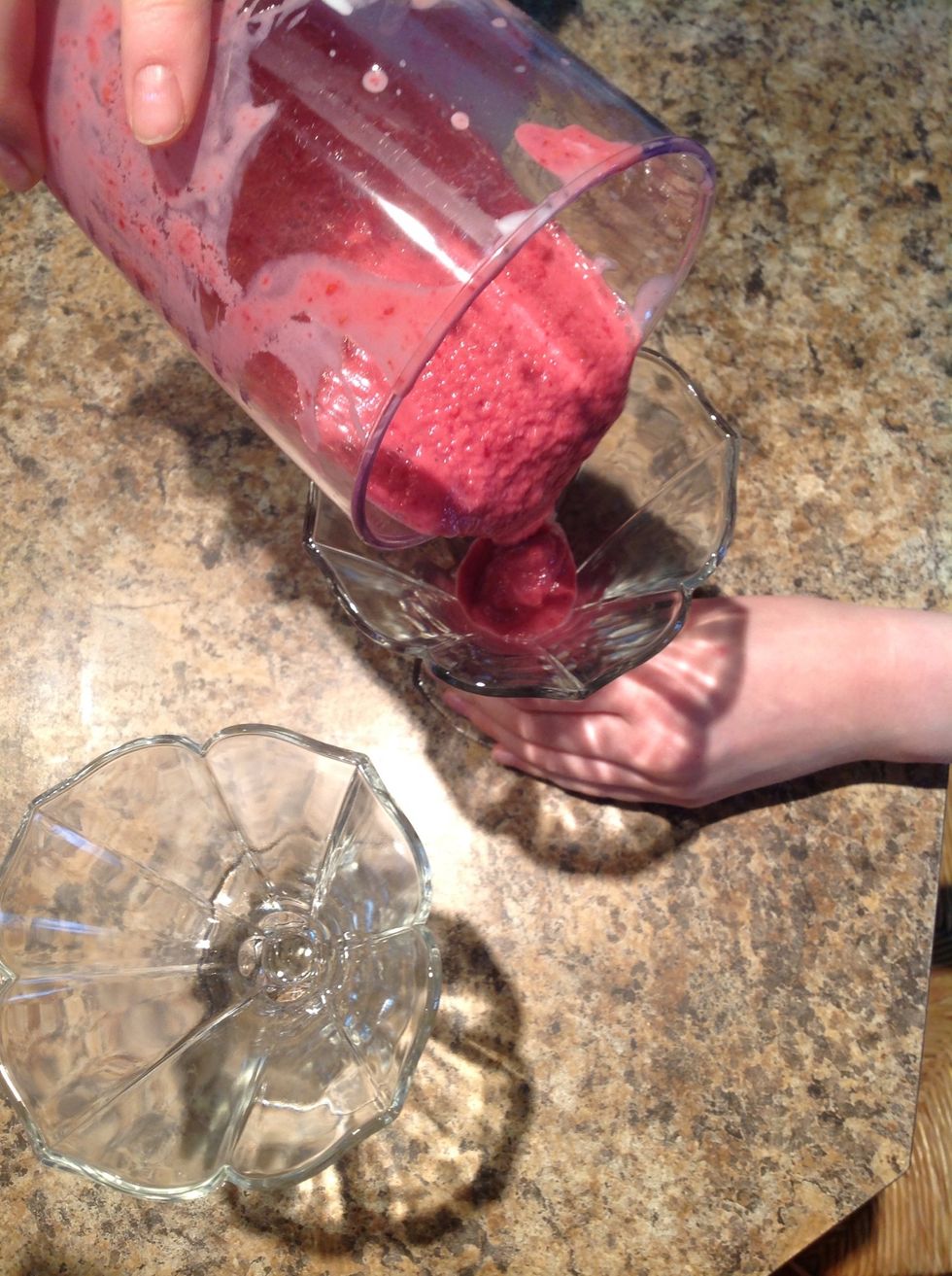 Equally pour the rasberry smoothie in 3 glasses. It should fill half of each glass