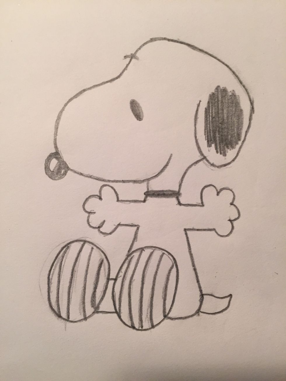Erase any stray lines and darken the ones you want to keep. And we're done! Snoopy, the WWI Flying Ace, the great novelist... Who knows what he'll do next?