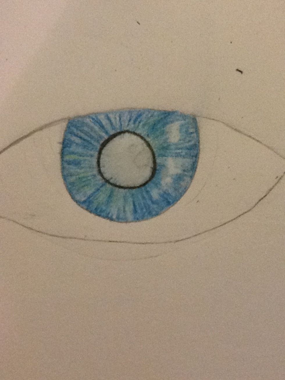 Erase lightly and use the light colored pencil to add detail