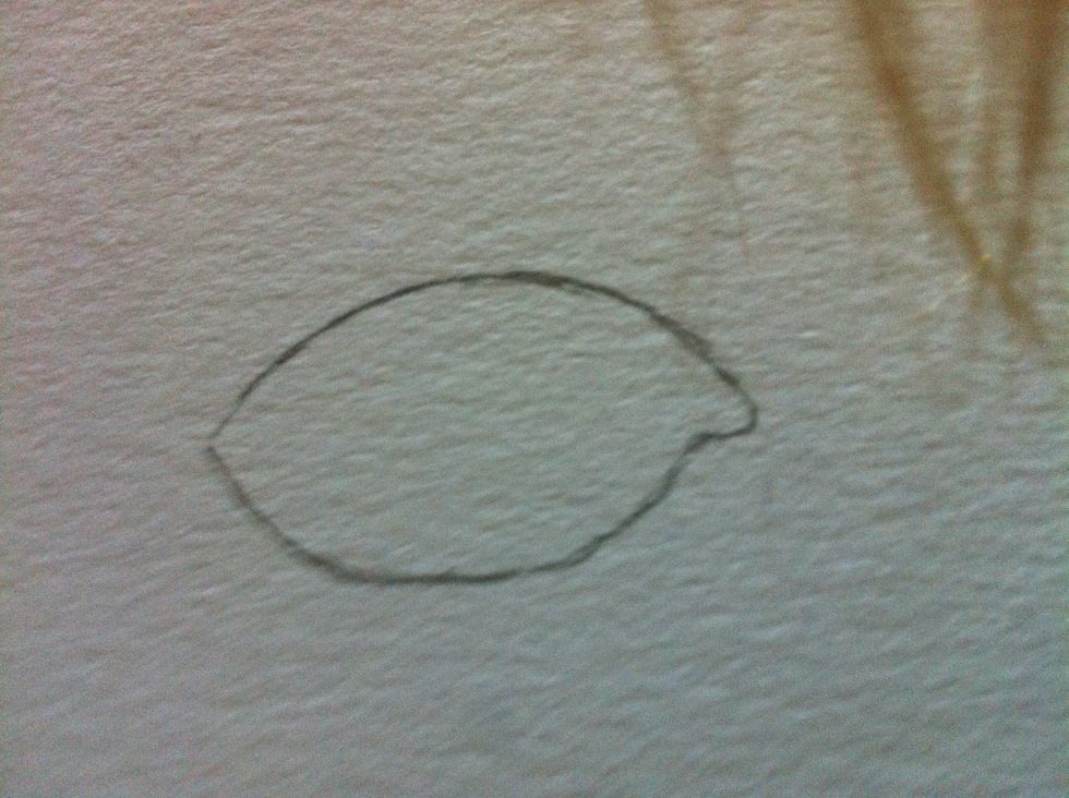 Erase one corner and add the tear duct. Most people forget to add this, but it's one of the crucial elements for drawing a realistic eye. Sorry my hair is in the picture...oops.