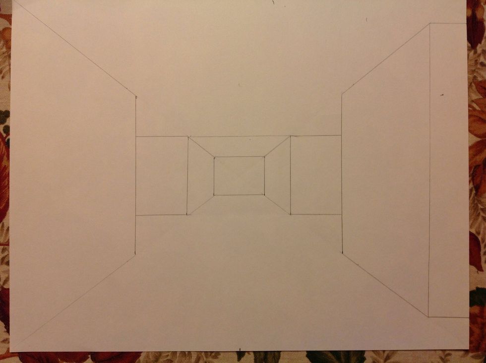 Erase the diagonals from the center rectangle. You can also erase the the bottom horizontal line of the second rectangle you drew.