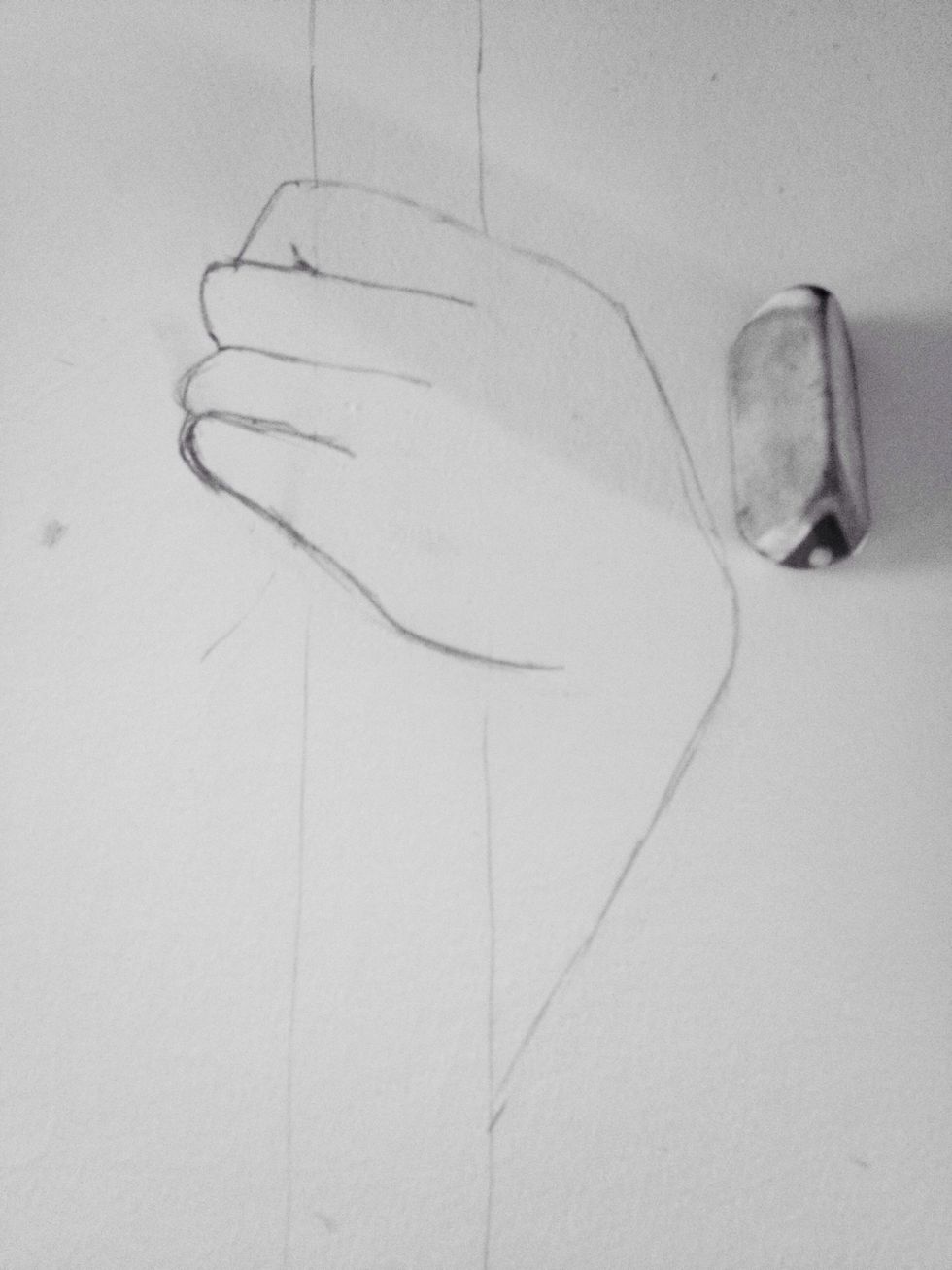 Erase the lines of the staff in the hand.