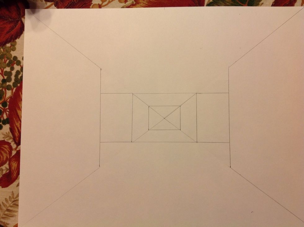 Erase the short diagonal lines that run from the corners of the rectangle to the vertical line. Refer to the image to see if your drawing matches up.