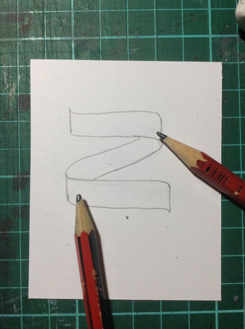 Erase these two lines (where pencils are pointing)