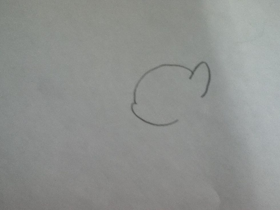 erease part of circle and add an ear and a mouth