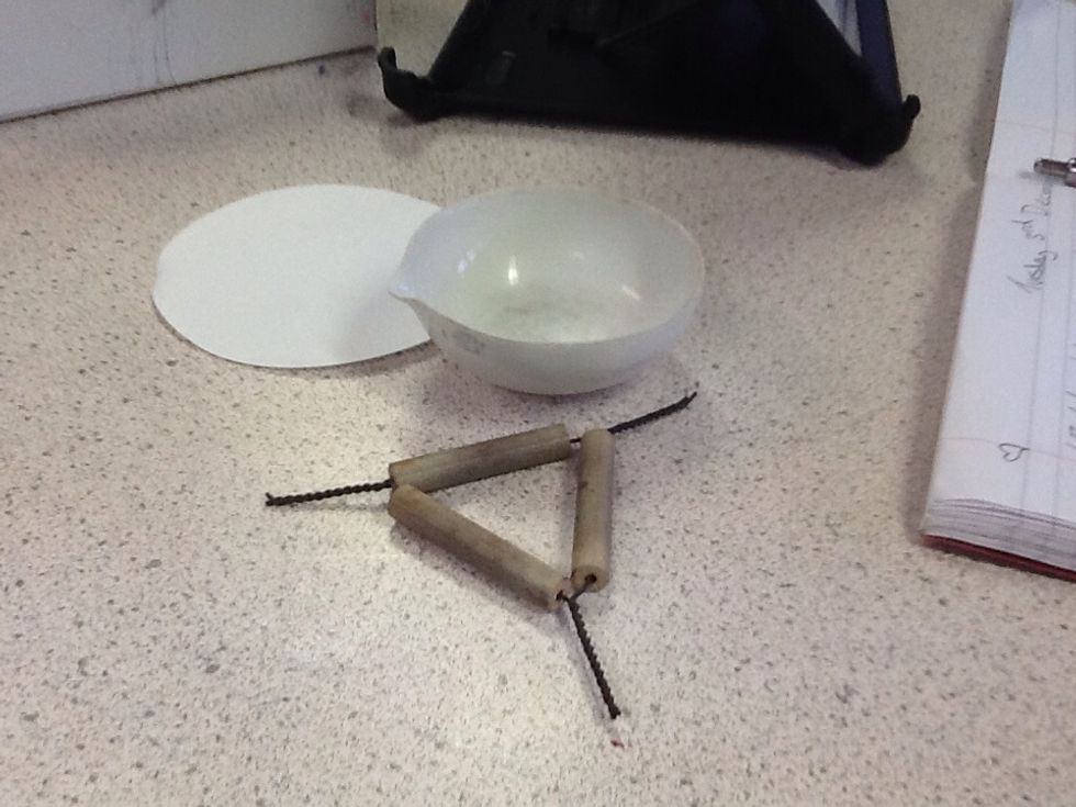 Evaporating basin, filter paper and corks