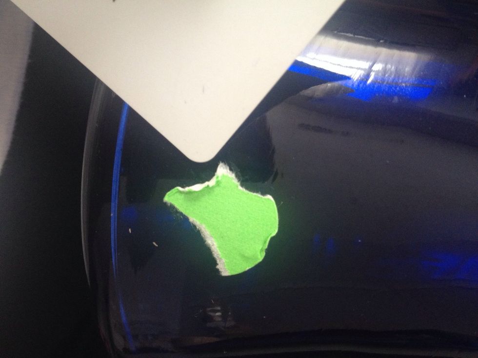 Even after trying with a plastic card ( I used an old hotel key )