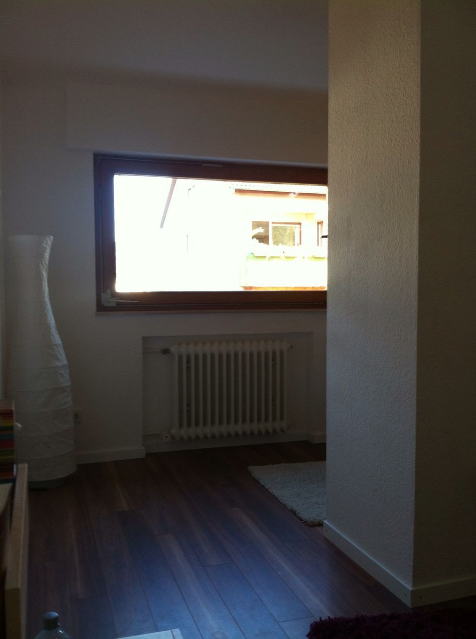 Even from the bed you don't see that it is a wardrobe (but some neighbours have a clear view of our underwear...)