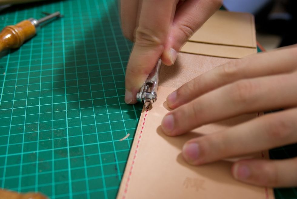 Even out stitches with the over stitch wheel.