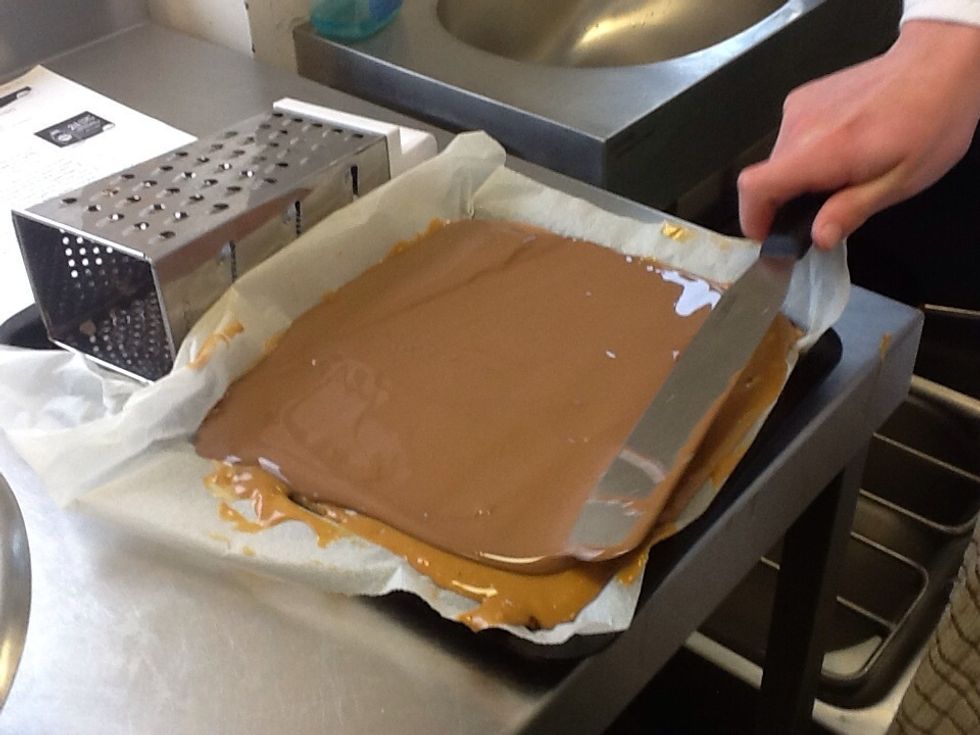 Even the chocolate and leave to cool down at room temperature. U can cool it in the fridge as well