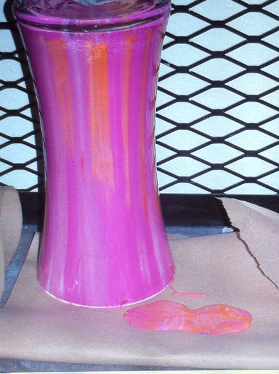 Even though I had drained the paint into another vase, the puddle next to this vase shows how much run off you will still get while the vase is drying.