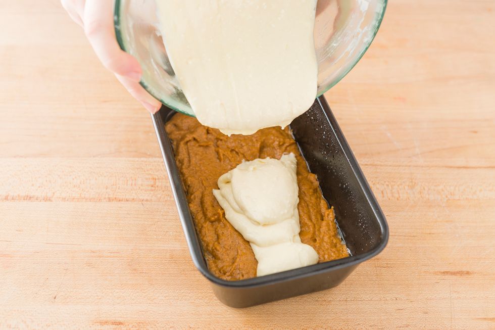 Evenly pour your cream cheese onto the pumpkin batter mixture. Use a spatula to gently smooth the top and to spread the cream cheese out as much as possible.