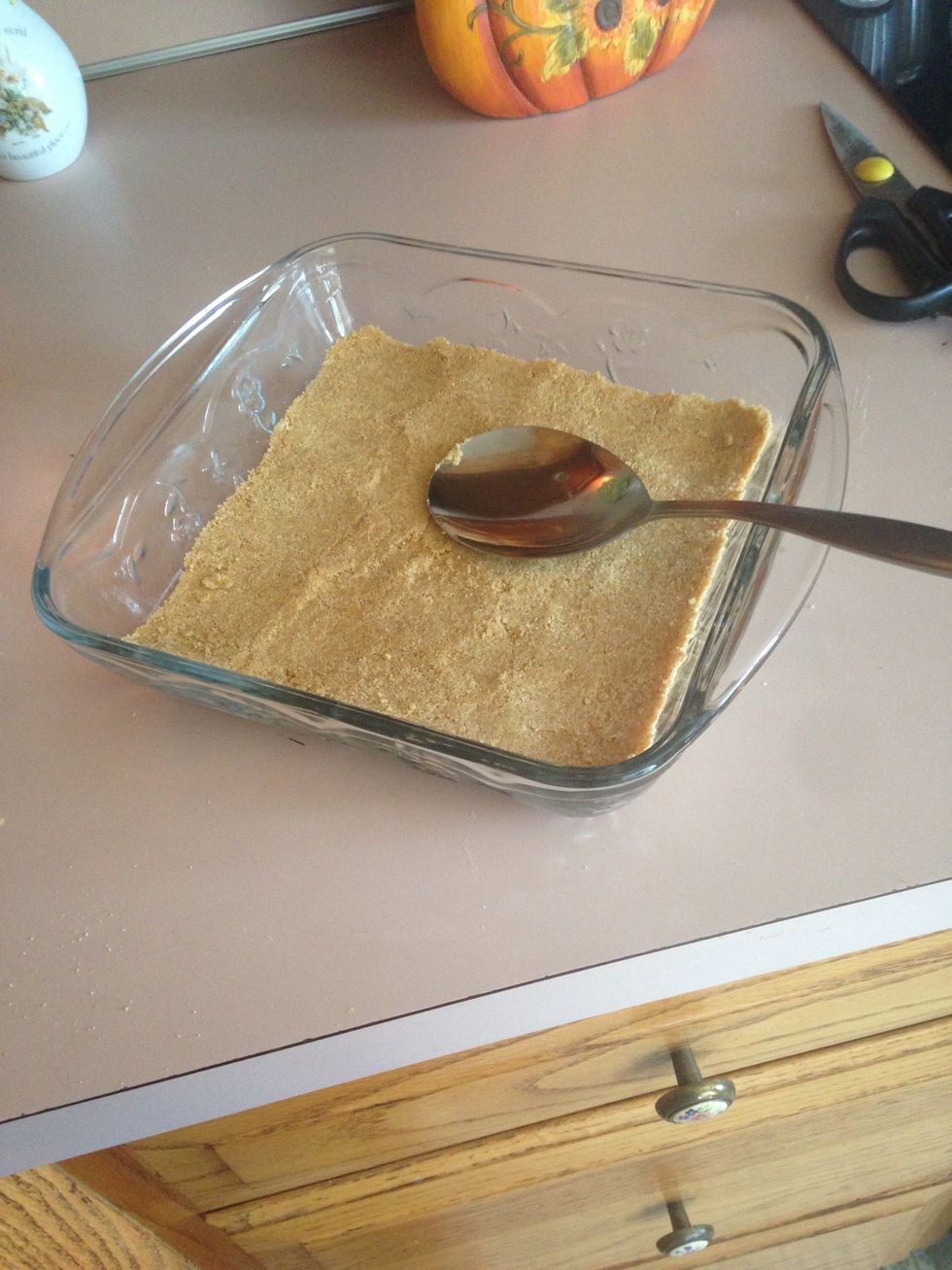 Evenly press crust mixture in pan using the back of a spoon