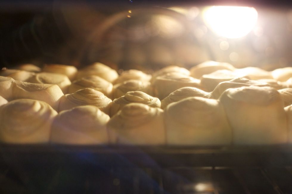 Eventually the rolls should take up all the space on the cookie sheet.